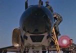 Image of Ground crew with returning RF-4C aircraft Ubon Ratchathani Thailand, 1967, second 29 stock footage video 65675038915