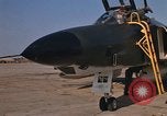 Image of Ground crew with returning RF-4C aircraft Ubon Ratchathani Thailand, 1967, second 36 stock footage video 65675038915