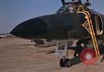 Image of Ground crew with returning RF-4C aircraft Ubon Ratchathani Thailand, 1967, second 39 stock footage video 65675038915