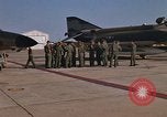 Image of Ground crew with returning RF-4C aircraft Ubon Ratchathani Thailand, 1967, second 42 stock footage video 65675038915