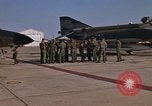 Image of Ground crew with returning RF-4C aircraft Ubon Ratchathani Thailand, 1967, second 43 stock footage video 65675038915