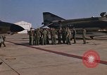 Image of Ground crew with returning RF-4C aircraft Ubon Ratchathani Thailand, 1967, second 44 stock footage video 65675038915