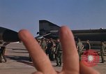 Image of Ground crew with returning RF-4C aircraft Ubon Ratchathani Thailand, 1967, second 46 stock footage video 65675038915