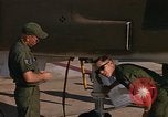 Image of Ground crew with returning RF-4C aircraft Ubon Ratchathani Thailand, 1967, second 50 stock footage video 65675038915