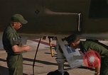 Image of Ground crew with returning RF-4C aircraft Ubon Ratchathani Thailand, 1967, second 51 stock footage video 65675038915
