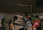 Image of Ground crew with returning RF-4C aircraft Ubon Ratchathani Thailand, 1967, second 53 stock footage video 65675038915
