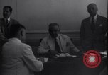 Image of Officials sign documents United States USA, 1951, second 40 stock footage video 65675038981
