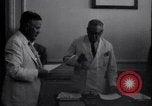 Image of Officials sign documents United States USA, 1951, second 59 stock footage video 65675038981