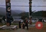 Image of totem poles Alaska USA, 1960, second 1 stock footage video 65675038983