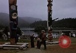 Image of totem poles Alaska USA, 1960, second 4 stock footage video 65675038983