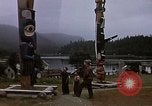 Image of totem poles Alaska USA, 1960, second 5 stock footage video 65675038983