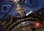 Image of totem poles Alaska USA, 1960, second 10 stock footage video 65675038983