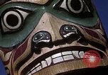 Image of totem poles Alaska USA, 1960, second 12 stock footage video 65675038983