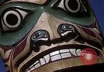 Image of totem poles Alaska USA, 1960, second 13 stock footage video 65675038983