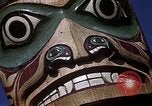 Image of totem poles Alaska USA, 1960, second 14 stock footage video 65675038983