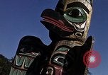 Image of totem poles Alaska USA, 1960, second 20 stock footage video 65675038983