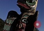 Image of totem poles Alaska USA, 1960, second 22 stock footage video 65675038983