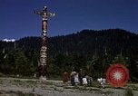 Image of totem poles Alaska USA, 1960, second 26 stock footage video 65675038983