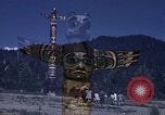 Image of totem poles Alaska USA, 1960, second 27 stock footage video 65675038983