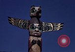 Image of totem poles Alaska USA, 1960, second 31 stock footage video 65675038983