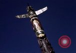 Image of totem poles Alaska USA, 1960, second 32 stock footage video 65675038983