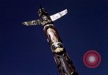 Image of totem poles Alaska USA, 1960, second 34 stock footage video 65675038983