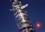 Image of totem poles Alaska USA, 1960, second 36 stock footage video 65675038983
