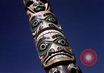 Image of totem poles Alaska USA, 1960, second 37 stock footage video 65675038983