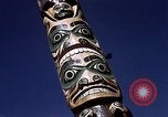 Image of totem poles Alaska USA, 1960, second 38 stock footage video 65675038983