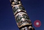 Image of totem poles Alaska USA, 1960, second 40 stock footage video 65675038983