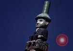Image of totem poles Alaska USA, 1960, second 52 stock footage video 65675038983