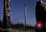 Image of totem poles Alaska USA, 1960, second 54 stock footage video 65675038983