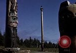 Image of totem poles Alaska USA, 1960, second 56 stock footage video 65675038983