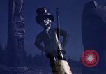 Image of totem poles Alaska USA, 1960, second 59 stock footage video 65675038983
