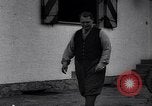 Image of Hermann Goring with pet lion cub at his hunting lodge Germany, 1935, second 4 stock footage video 65675039012