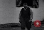 Image of Hermann Goring with pet lion cub at his hunting lodge Germany, 1935, second 5 stock footage video 65675039012