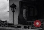 Image of Hermann Goring with pet lion cub at his hunting lodge Germany, 1935, second 14 stock footage video 65675039012