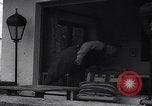 Image of Hermann Goring with pet lion cub at his hunting lodge Germany, 1935, second 16 stock footage video 65675039012