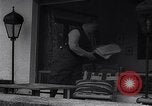 Image of Hermann Goring with pet lion cub at his hunting lodge Germany, 1935, second 17 stock footage video 65675039012