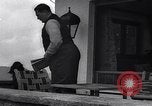 Image of Hermann Goring with pet lion cub at his hunting lodge Germany, 1935, second 21 stock footage video 65675039012