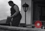 Image of Hermann Goring with pet lion cub at his hunting lodge Germany, 1935, second 22 stock footage video 65675039012