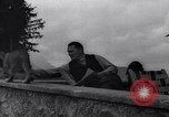 Image of Hermann Goring with pet lion cub at his hunting lodge Germany, 1935, second 33 stock footage video 65675039012