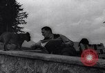 Image of Hermann Goring with pet lion cub at his hunting lodge Germany, 1935, second 34 stock footage video 65675039012