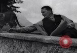 Image of Hermann Goring with pet lion cub at his hunting lodge Germany, 1935, second 36 stock footage video 65675039012