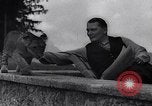 Image of Hermann Goring with pet lion cub at his hunting lodge Germany, 1935, second 37 stock footage video 65675039012