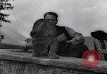 Image of Hermann Goring with pet lion cub at his hunting lodge Germany, 1935, second 39 stock footage video 65675039012