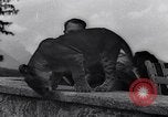 Image of Hermann Goring with pet lion cub at his hunting lodge Germany, 1935, second 40 stock footage video 65675039012