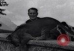Image of Hermann Goring with pet lion cub at his hunting lodge Germany, 1935, second 41 stock footage video 65675039012