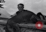 Image of Hermann Goring with pet lion cub at his hunting lodge Germany, 1935, second 42 stock footage video 65675039012