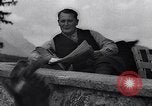 Image of Hermann Goring with pet lion cub at his hunting lodge Germany, 1935, second 44 stock footage video 65675039012